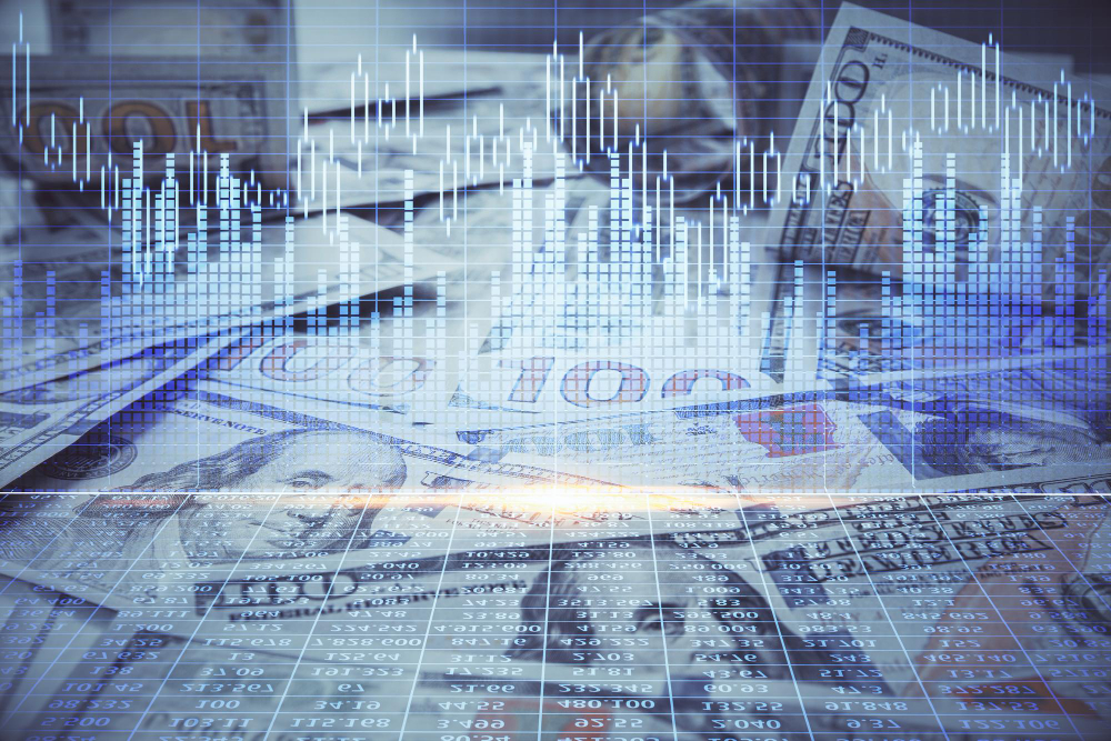 Hands typing on a keyboard while managing bookkeeping tasks and small business financial records